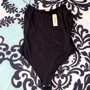 3/30 $ garage bodysuit